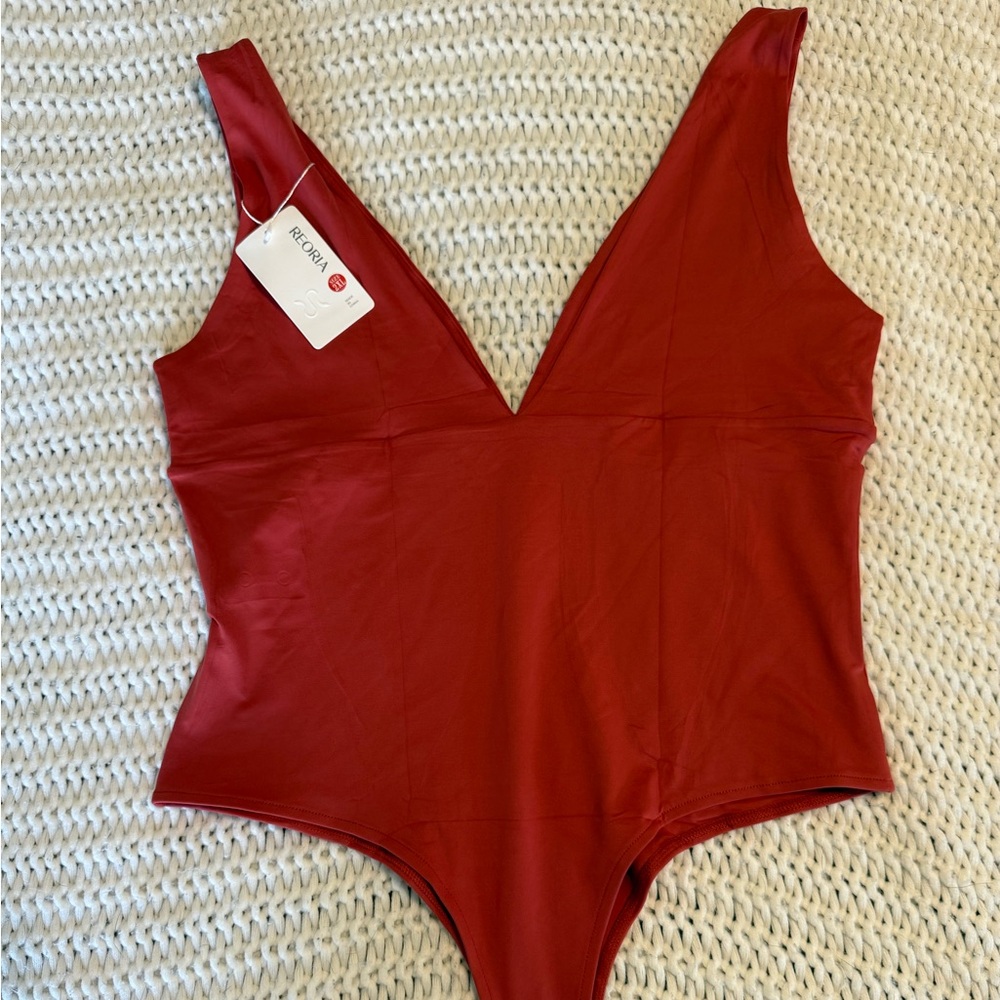 ReoRia Red Bodysuit with Plunging V-Neck and Modern Silhouette